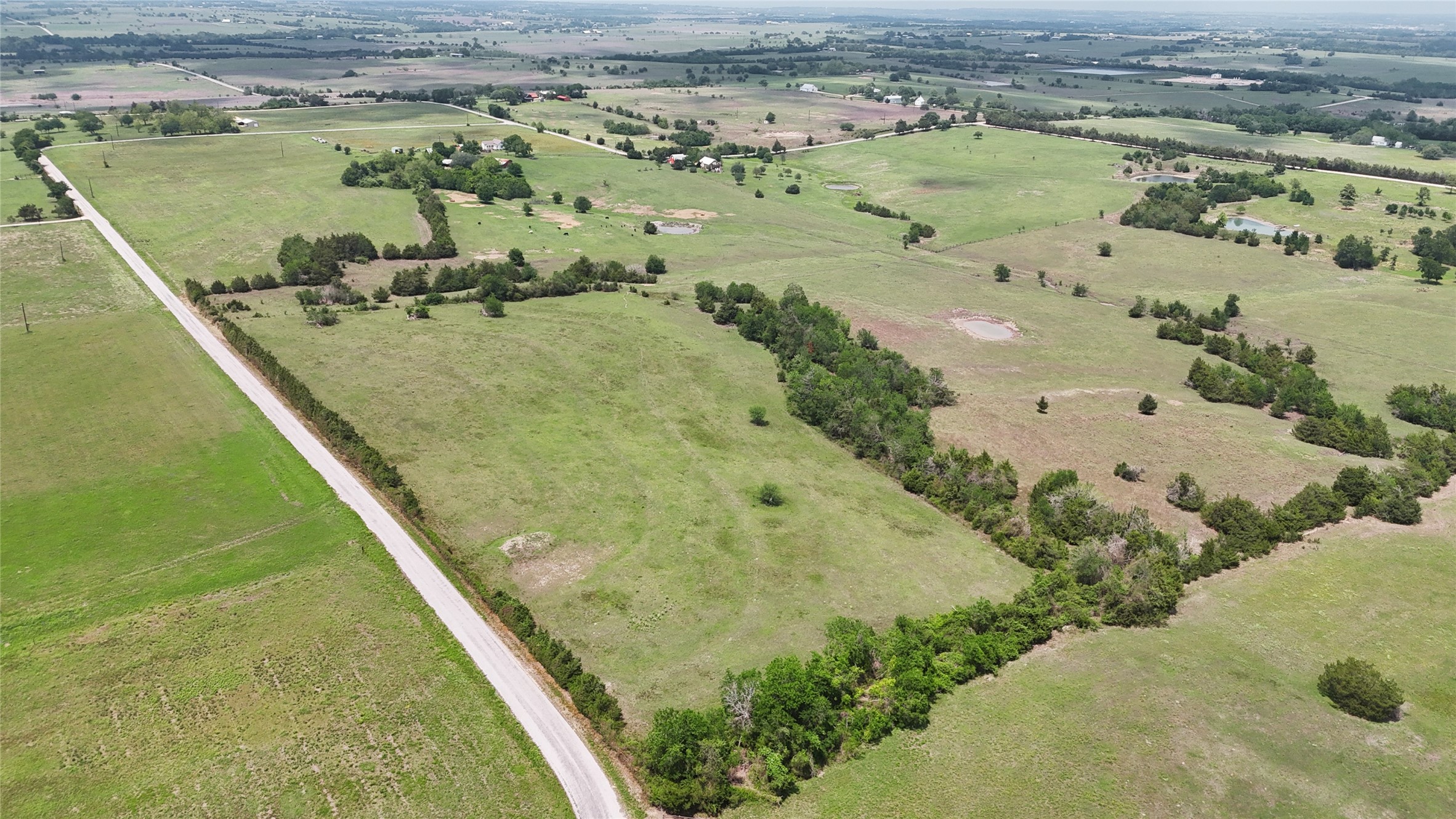 4754 Wickel Road Burton, TX 77835 - Photo 22 of 23 a view of a lake from a balcony