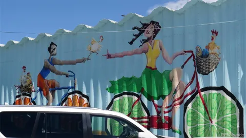 a sign on a pole on a street