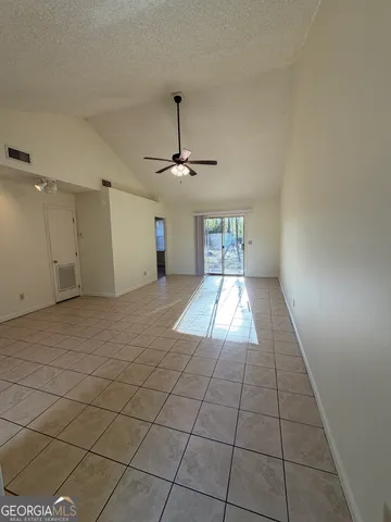 a view of an empty room and window