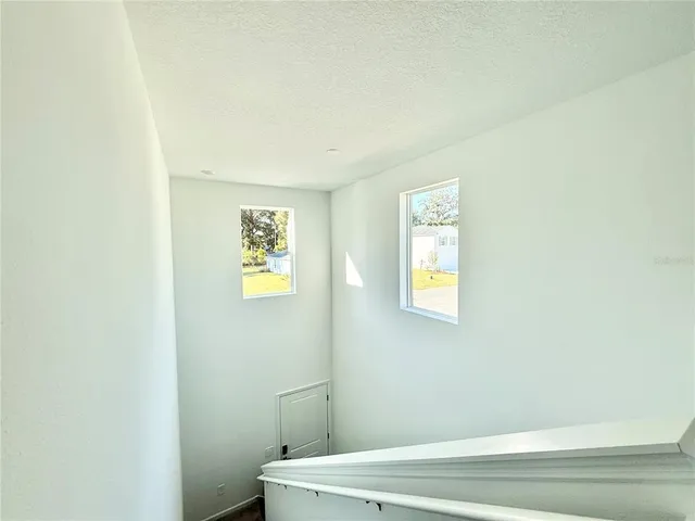 a bathroom with a toilet and a vanity