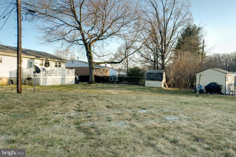 4748 Byron Road Windsor Mill, MD 21244 - Photo 1 of 27 a view of a house with a yard