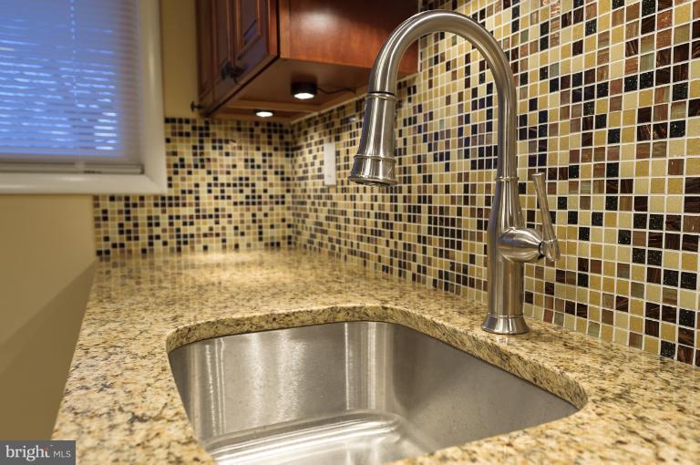 4748 Byron Road Windsor Mill, MD 21244 - Photo 2 of 27 a bathroom with a bathtub and shower