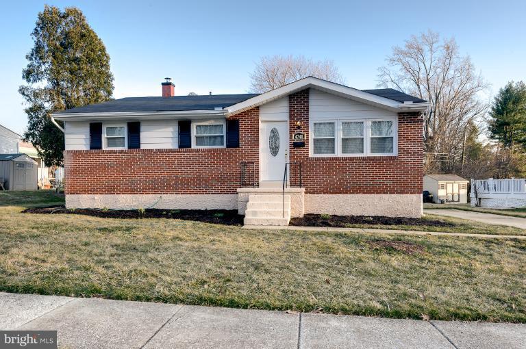 4748 Byron Road Windsor Mill, MD 21244 - Photo 26 of 27 a front view of a house with a yard