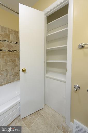 4748 Byron Road Windsor Mill, MD 21244 - Photo 10 of 27 a bathroom with a bathtub