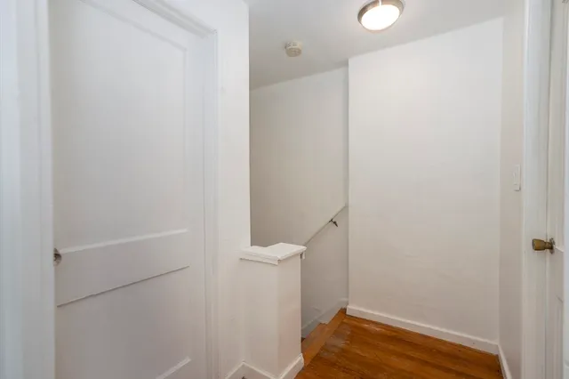 a view of small space with racks on the wall