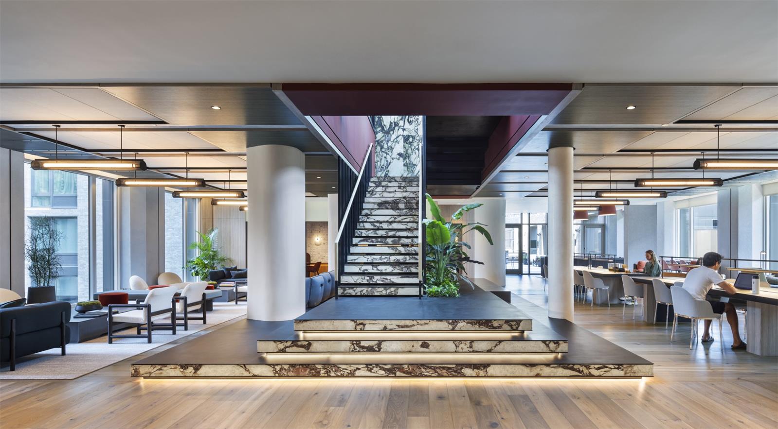 55 Suffolk Street, Unit 512 Manhattan, NY 10002 - Photo 14 of 23 a living room with furniture and a fireplace