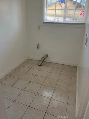 a view of a room and window