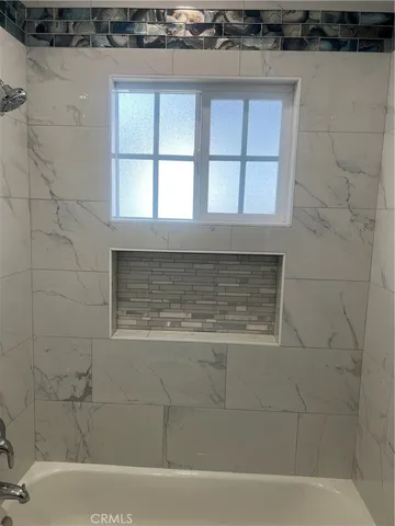 a bathroom with a bathtub