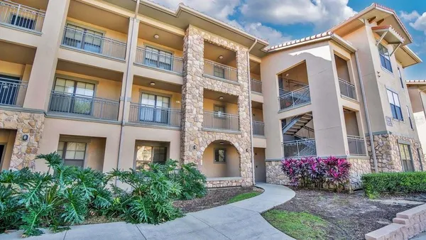 a front view of a multi story residential apartment building