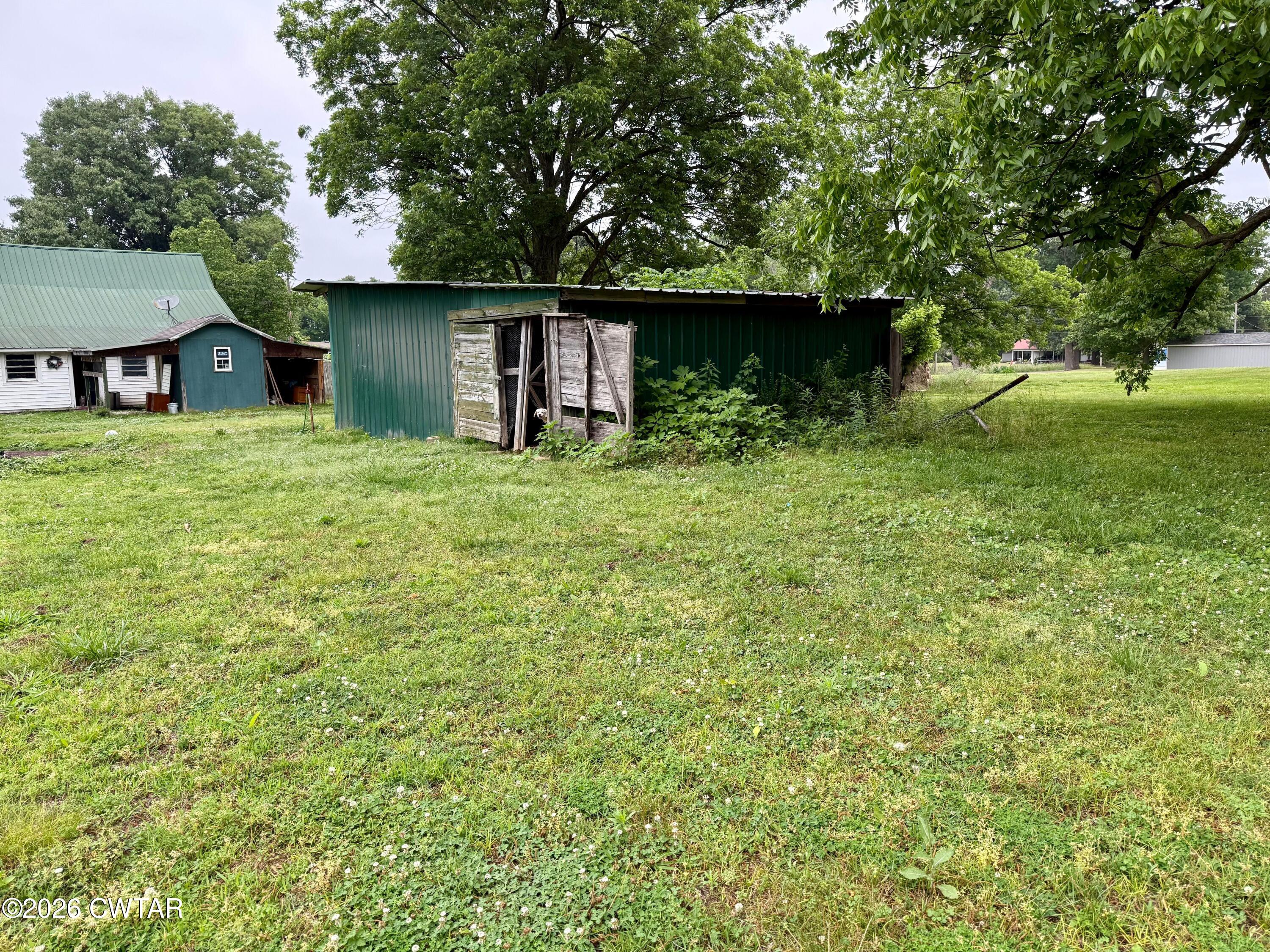 1935 Buster Collins Road Kenton, TN 38233 - Photo 16 of 18 a view of a house with a yard
