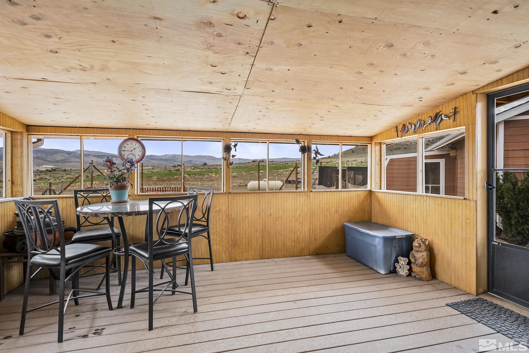 3655 Crazy Horse Road Reno, NV 89510 - Photo 11 of 31 a view of a chairs and table on the terrace