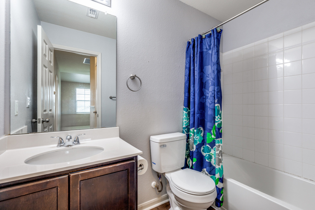 13708 Sierra Wind Lane Elgin, TX 78621 - Photo 17 of 19 Bathroom with shower / bath combo, and vanity