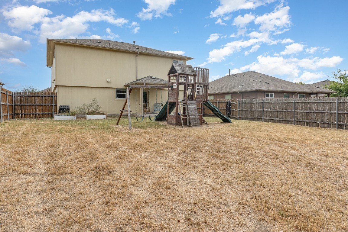13708 Sierra Wind Lane Elgin, TX 78621 - Photo 5 of 19 Tons of space for a pool, shed and more! Nice covered patio.