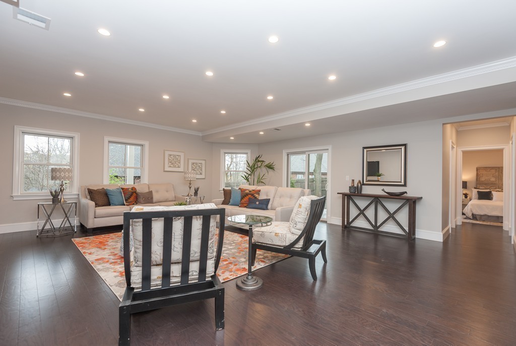 33 Winthrop Road, Unit 1 Brookline, MA 02445 - Photo 14 of 19 a view of a dining room with furniture window and wooden floor