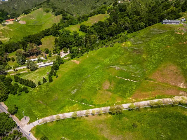 a view of a lush green field