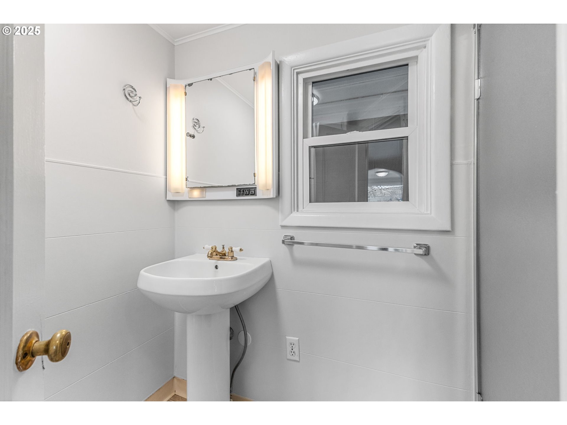 1605 Cottage Street Northeast Salem, OR 97301 - Photo 15 of 23 a bathroom with a sink mirror and a bathtub