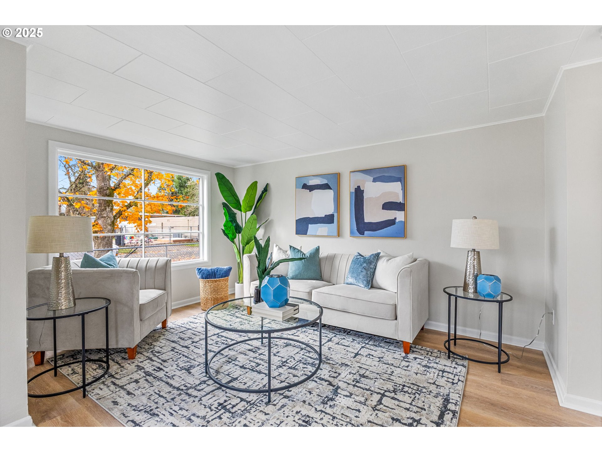 1605 Cottage Street Northeast Salem, OR 97301 - Photo 6 of 23 a living room with furniture and a large window