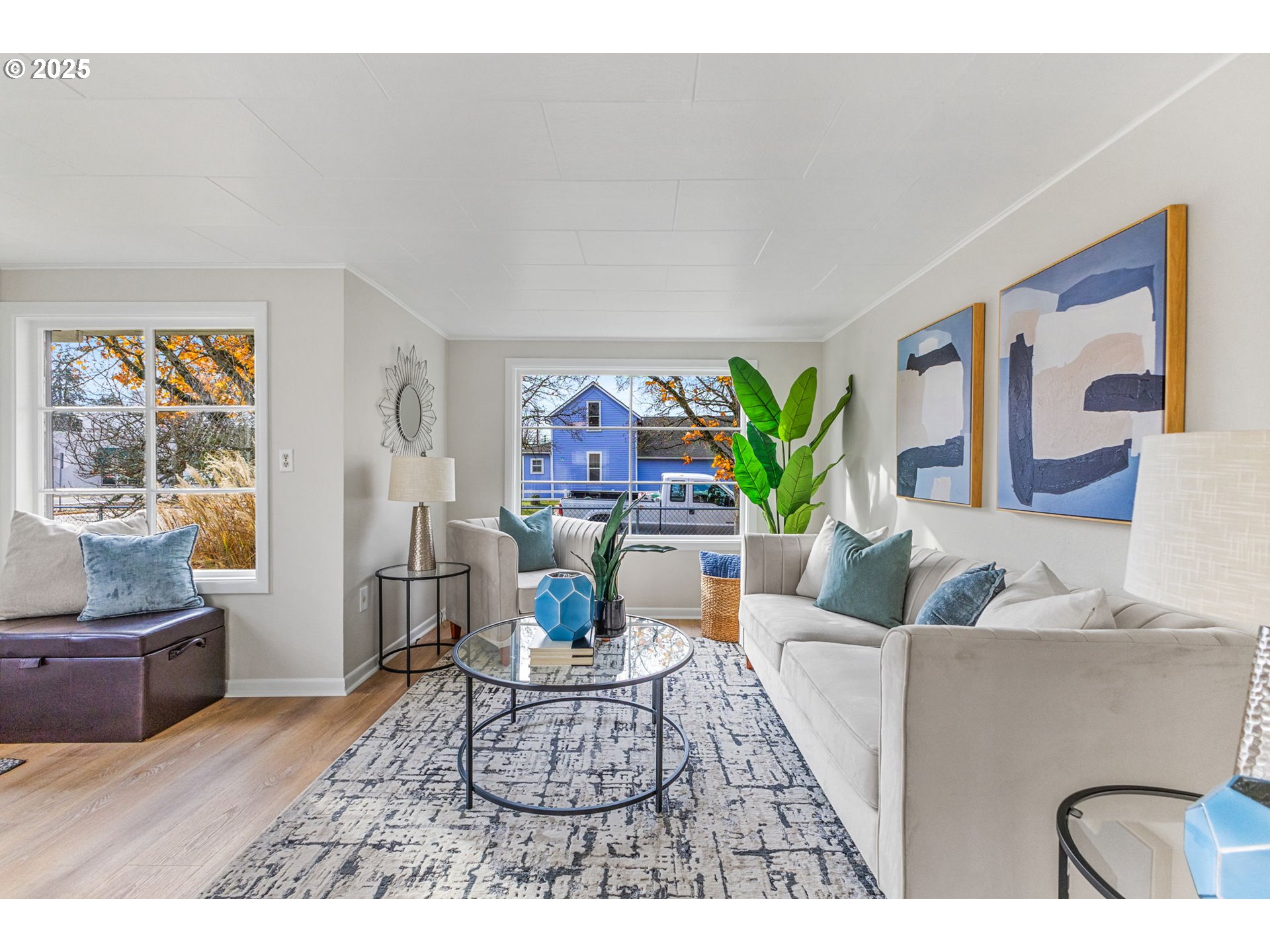 1605 Cottage Street Northeast Salem, OR 97301 - Photo 8 of 23 a living room with furniture and a potted plant