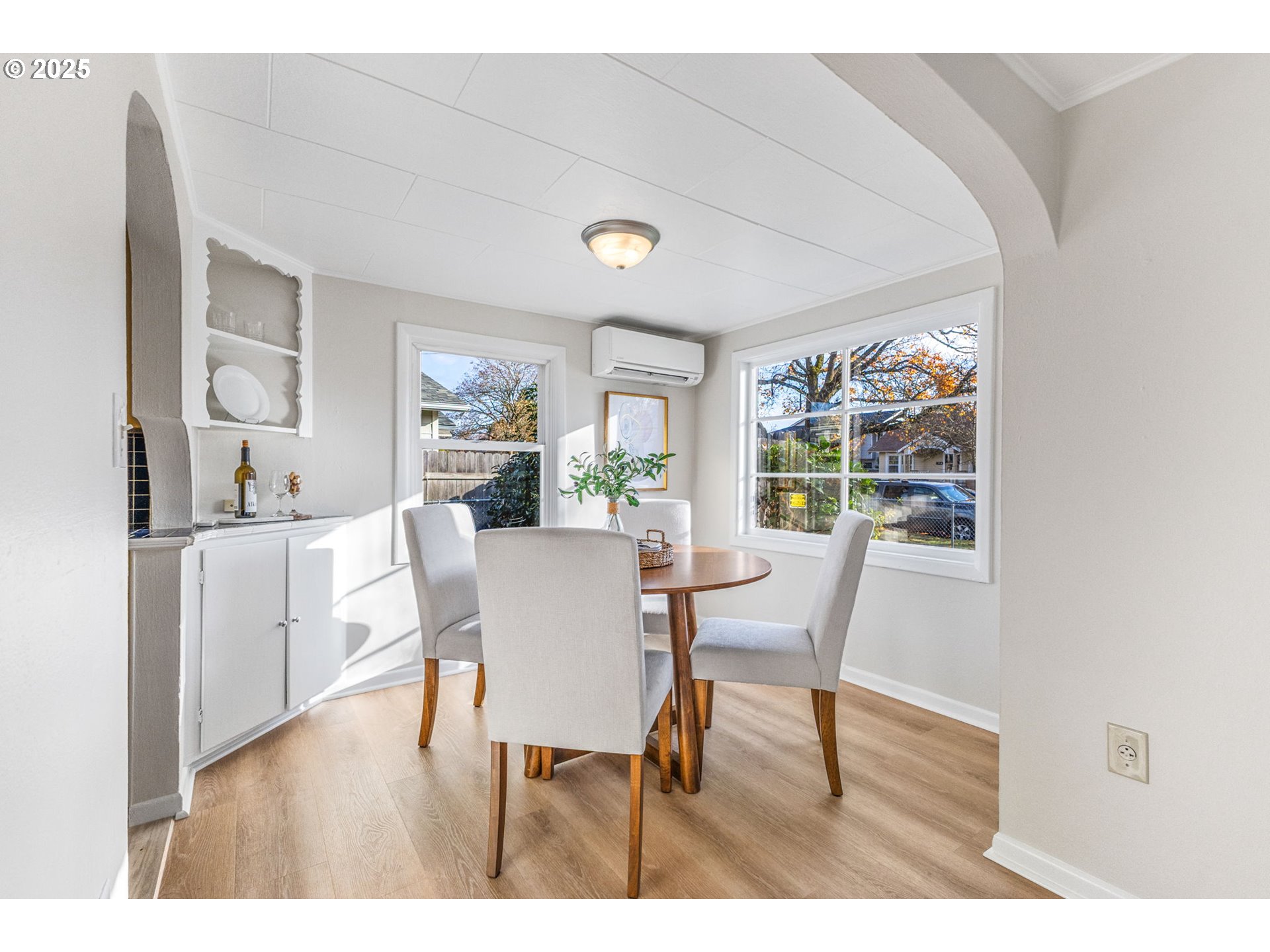 1605 Cottage Street Northeast Salem, OR 97301 - Photo 9 of 23 a view of a dining room with furniture and a potted plant