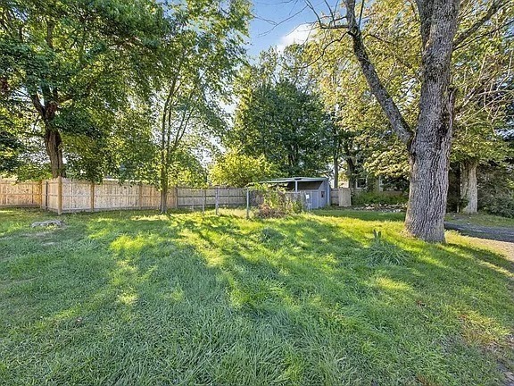 96 Pleasant Street, Unit 96 Ashland, MA 01721 - Photo 20 of 20 a view of a yard with a tree
