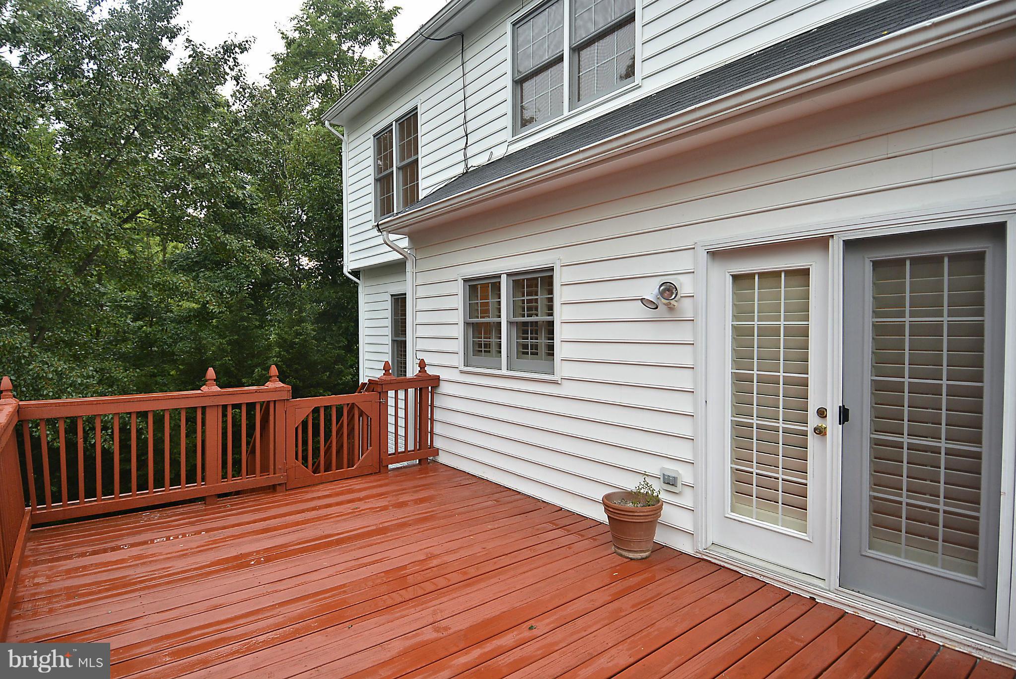 8763 Center Road Springfield, VA 22152 - Photo 30 of 30 Deck with Stairs to patio