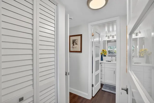 a kitchen with stainless steel appliances granite countertop a refrigerator sink and microwave