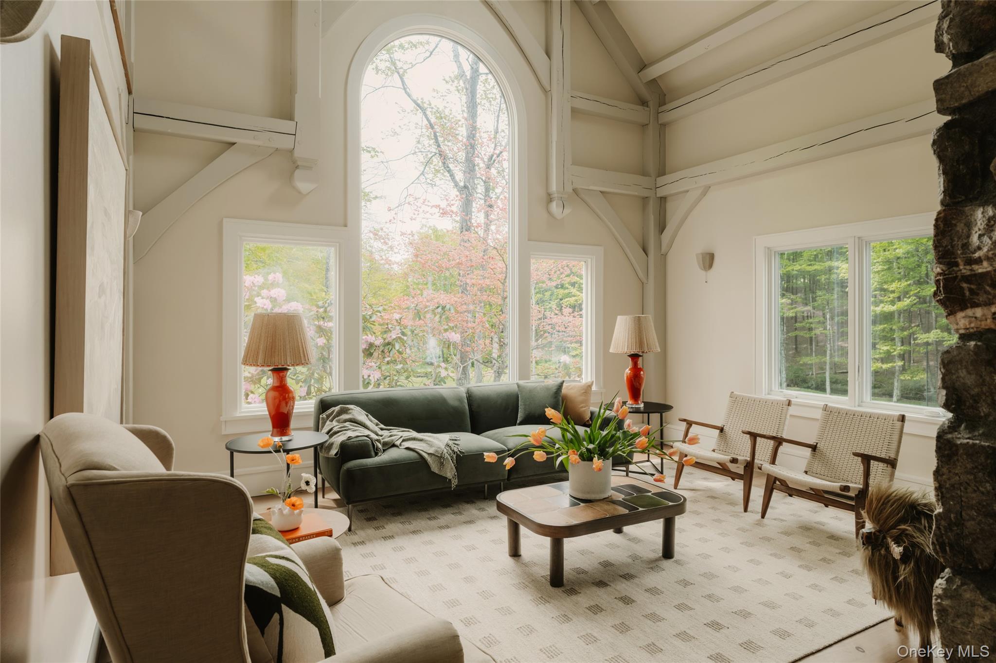 1046 Bulls Head Road Clinton Corners, NY 12514 - Photo 8 of 46 a living room with furniture and a large window