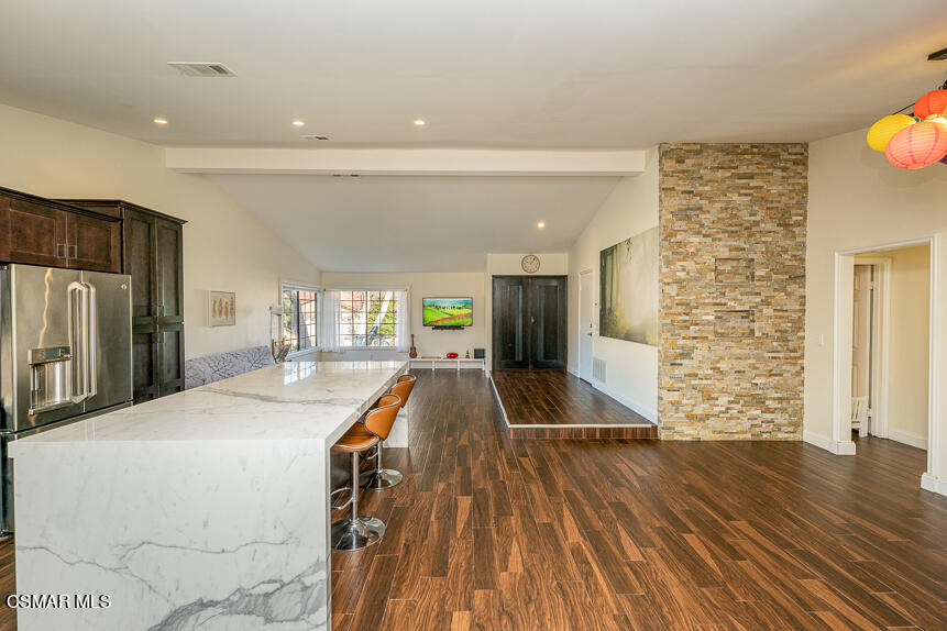 13680 Bear Valley Road Moorpark, CA 93021 - Photo 12 of 50 a room with pool table wooden floor and a hallway