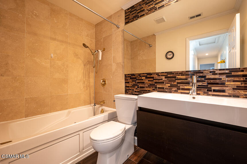 13680 Bear Valley Road Moorpark, CA 93021 - Photo 13 of 50 a bathroom with a sink a toilet and shower