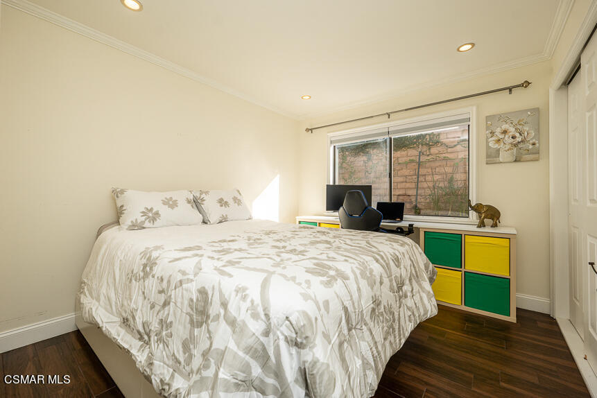 13680 Bear Valley Road Moorpark, CA 93021 - Photo 14 of 50 a bedroom with bed and a window