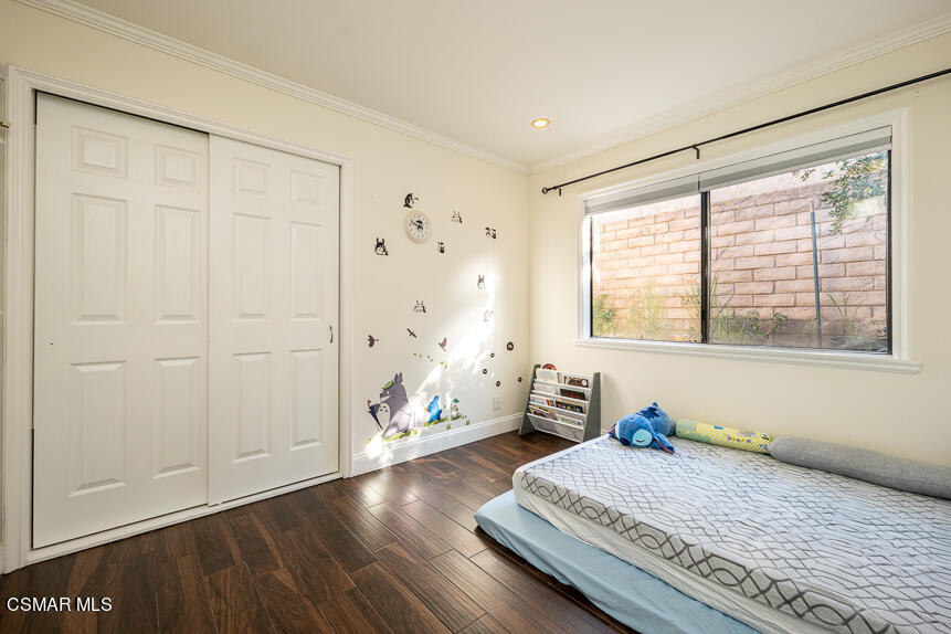 13680 Bear Valley Road Moorpark, CA 93021 - Photo 17 of 50 a bedroom with bed and window