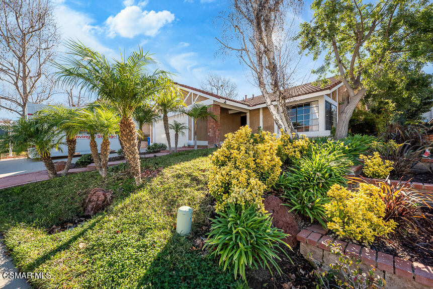 13680 Bear Valley Road Moorpark, CA 93021 - Photo 2 of 50 a yellow building with trees in front of it