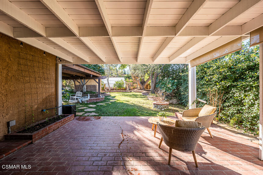 13680 Bear Valley Road Moorpark, CA 93021 - Photo 24 of 50 a patio with yard table and chairs
