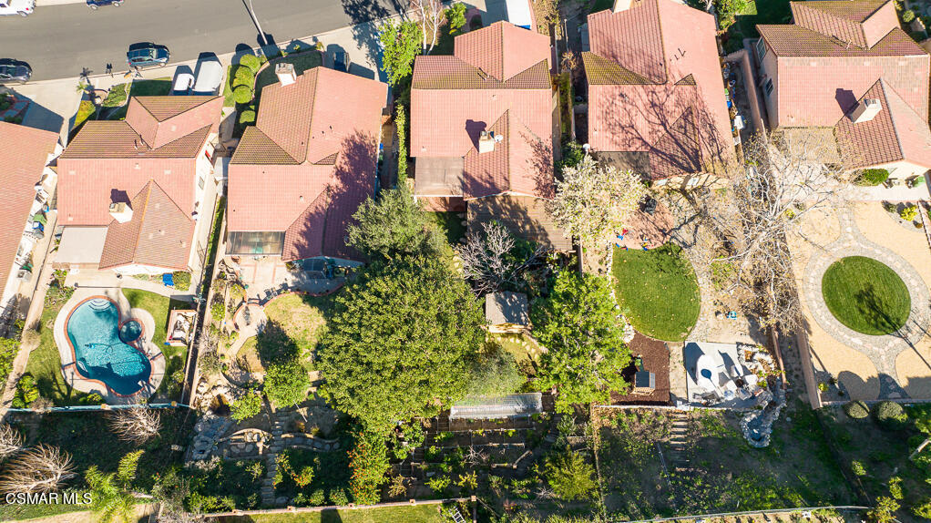 13680 Bear Valley Road Moorpark, CA 93021 - Photo 42 of 50 an aerial view of residential houses with outdoor space and swimming pool