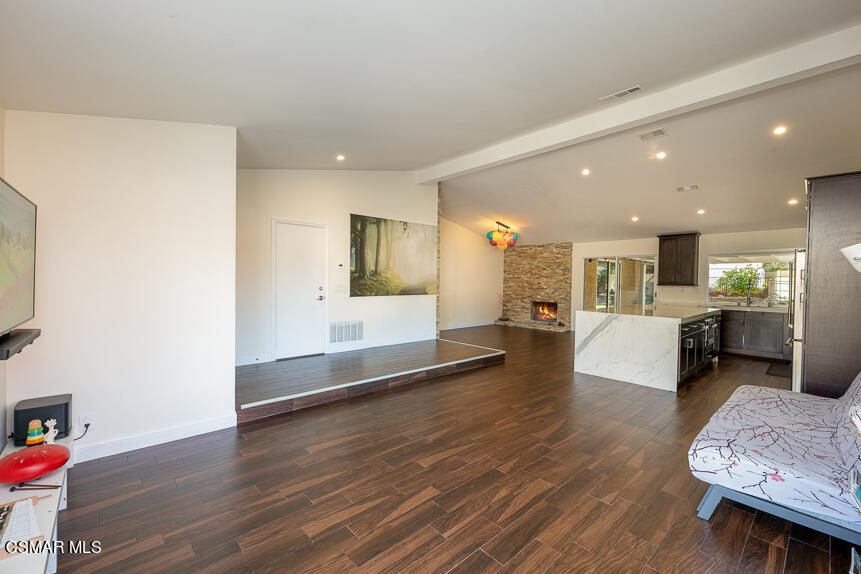 13680 Bear Valley Road Moorpark, CA 93021 - Photo 6 of 50 a living room with furniture and a wooden floor