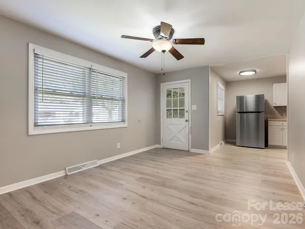 a view of a window in an empty room