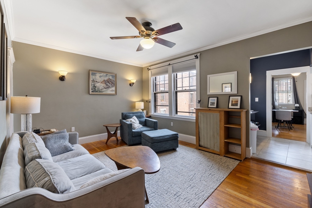 120 Sutherland Road, Unit 7 Boston, MA 02135 - Photo 2 of 25 a living room with furniture