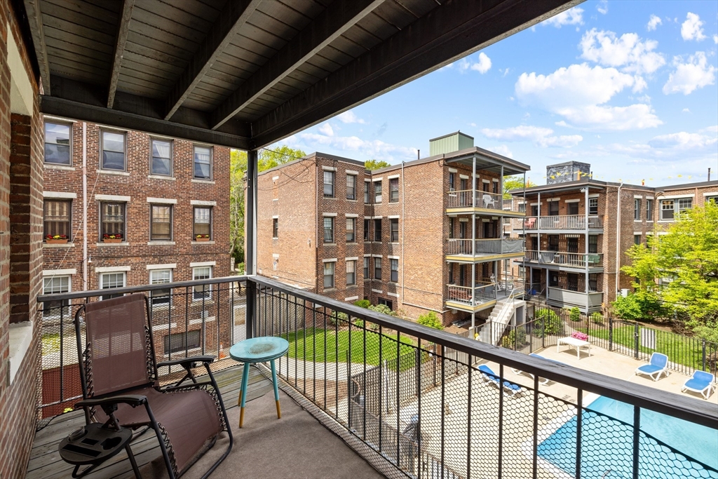 120 Sutherland Road, Unit 7 Boston, MA 02135 - Photo 21 of 25 a view of building from balcony