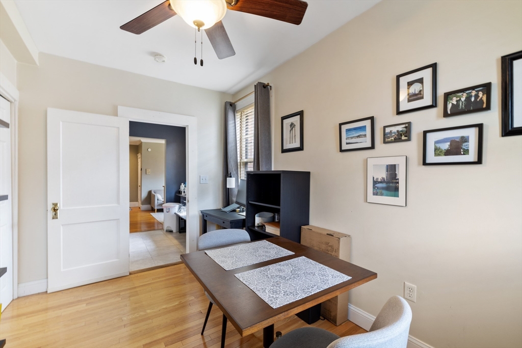 120 Sutherland Road, Unit 7 Boston, MA 02135 - Photo 8 of 25 a workspace with furniture and window