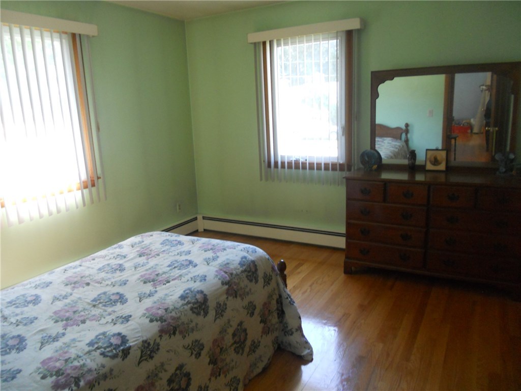 12 Lawrence Road North Providence, RI 02911 - Photo 19 of 40 12+1/2 X 11+1/2 BEDROOM, OAK HARDWOOD FLOORING, CASEMENT WINDOWS AND 10+1/4 FOOT CLOSET