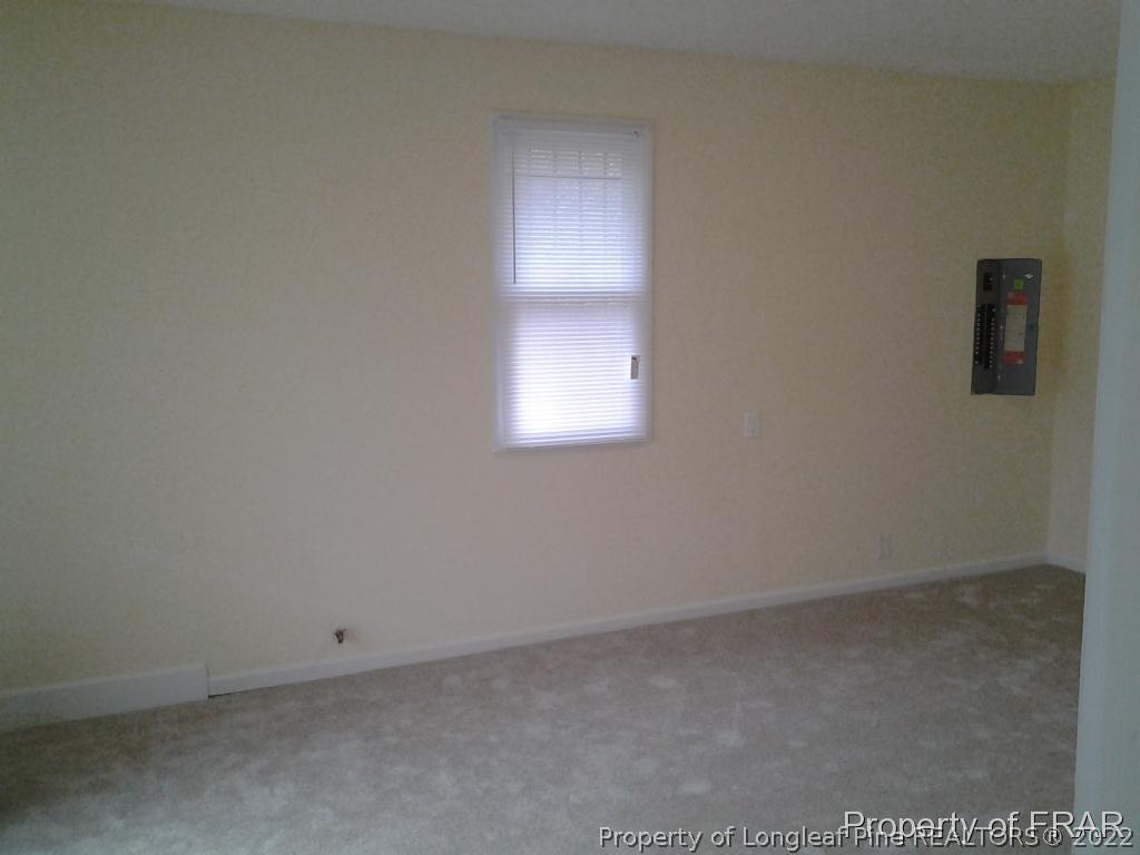 5074 Summer Ridge Road Fayetteville, NC 28303 - Photo 7 of 14 an empty room with a window