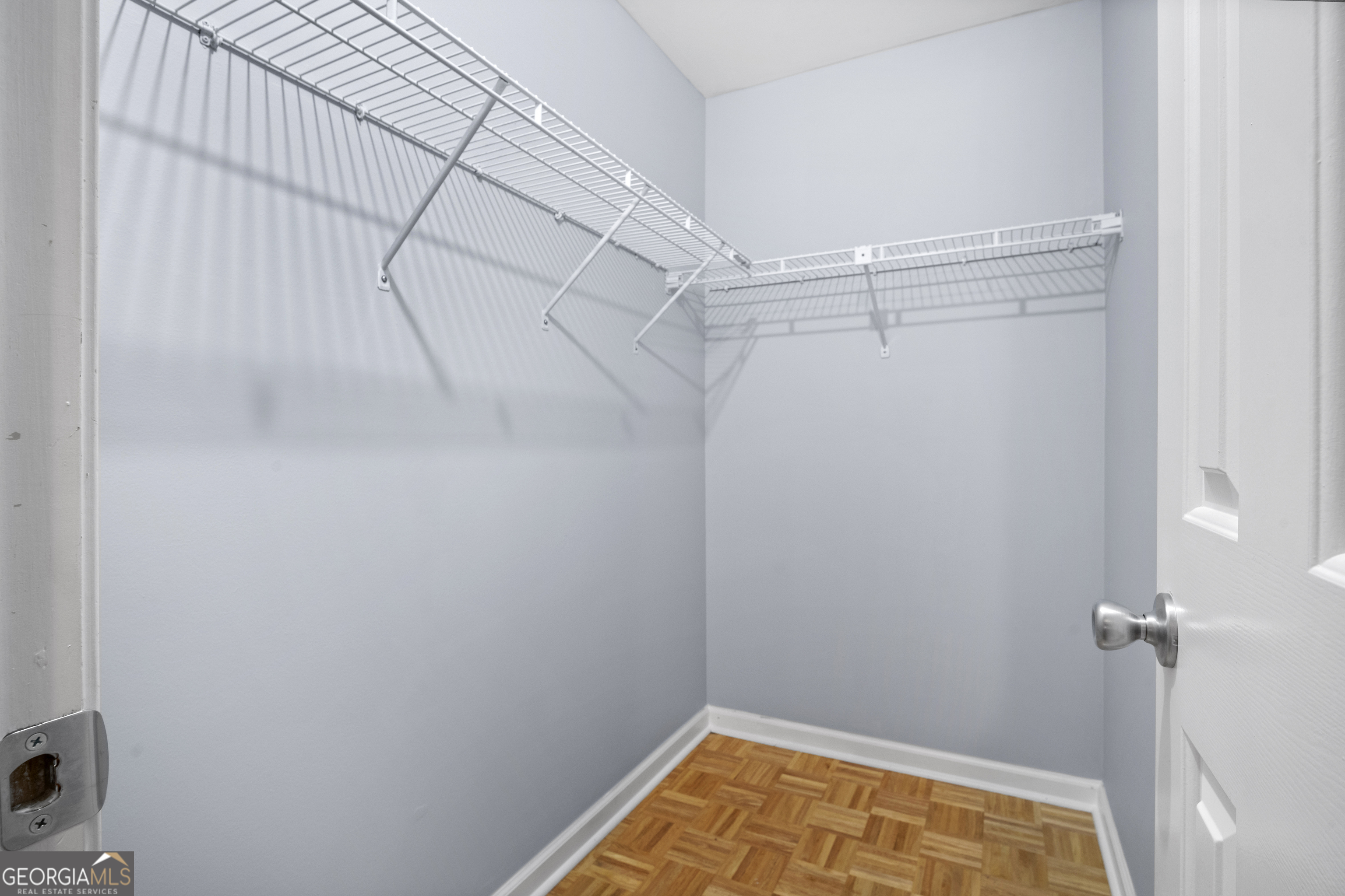 661 North Parkwood Road Decatur, GA 30030 - Photo 10 of 13 1 of the 2 Walk in closet featuring parquet flooring
