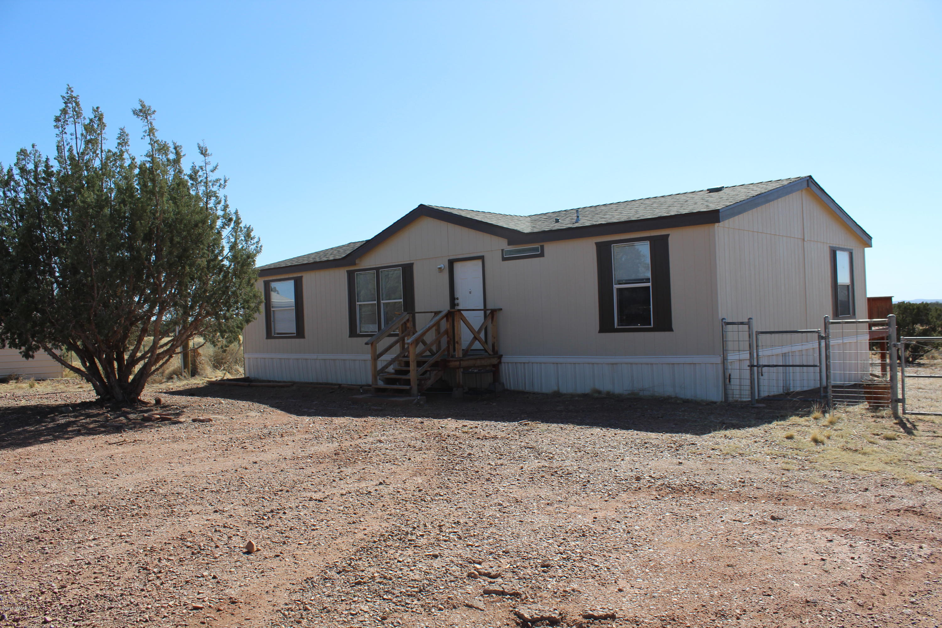 4714 Valley Road Snowflake, AZ 85937 - Photo 1 of 27 a view of a house with backyard