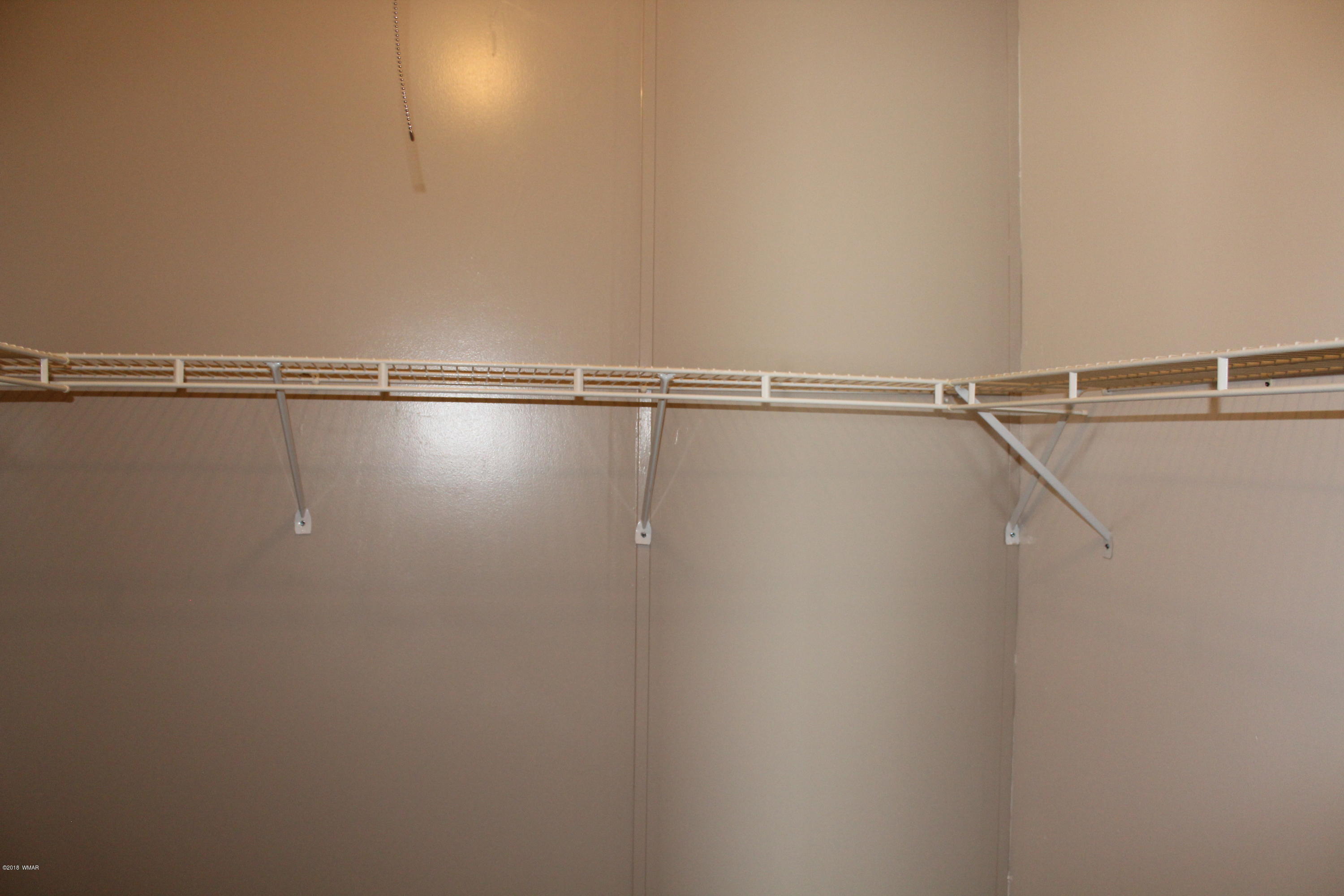 4714 Valley Road Snowflake, AZ 85937 - Photo 18 of 27 a view of a room with racks on the wall