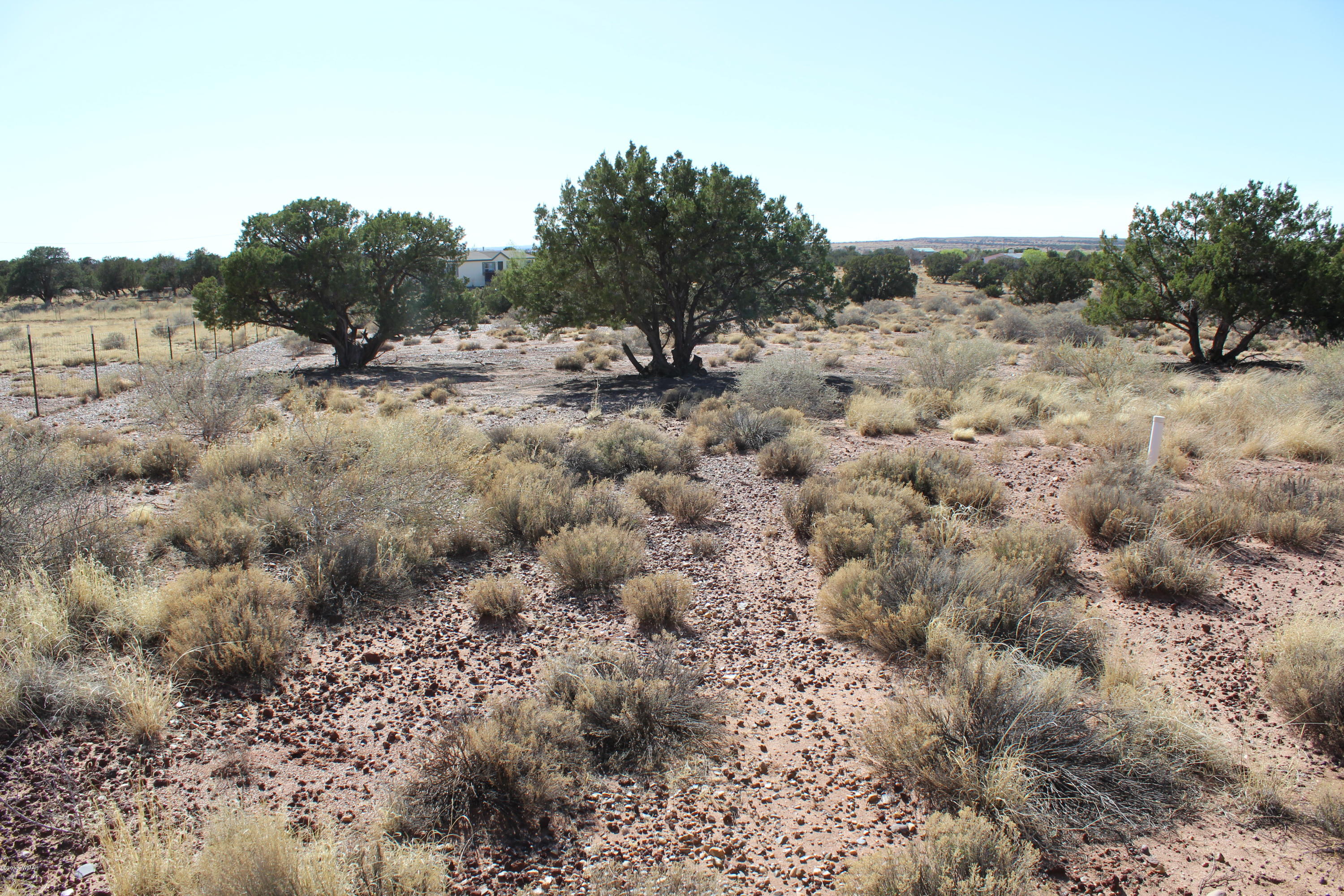4714 Valley Road Snowflake, AZ 85937 - Photo 22 of 27 a view of a field with trees in the background
