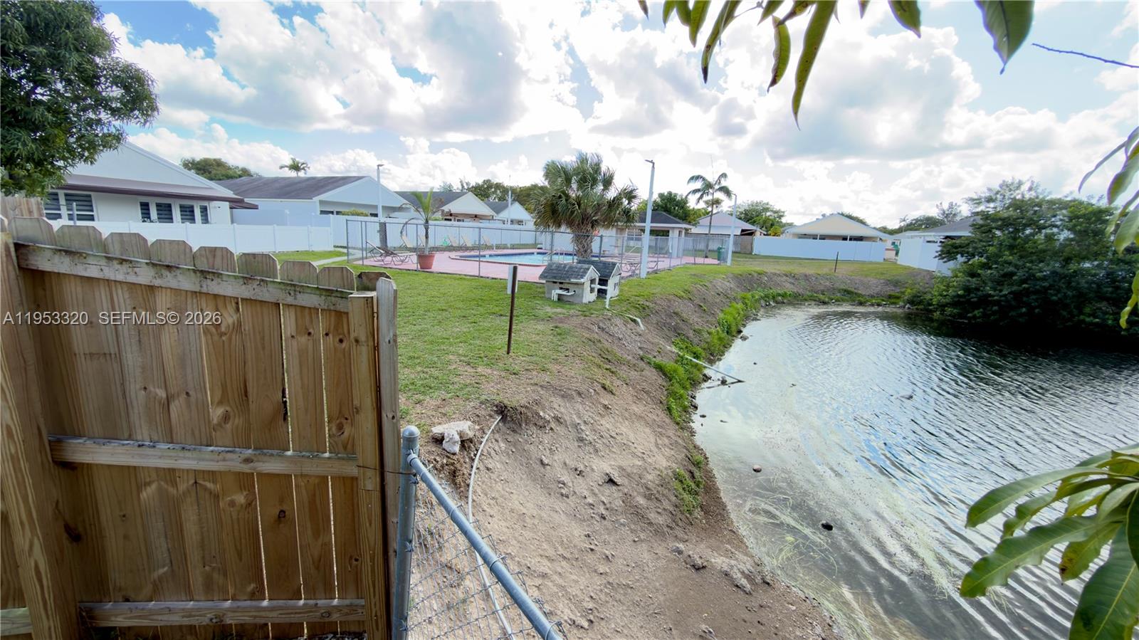7220 Southwest 149th Court Miami, FL 33193 - Photo 32 of 36 Canal and Pool