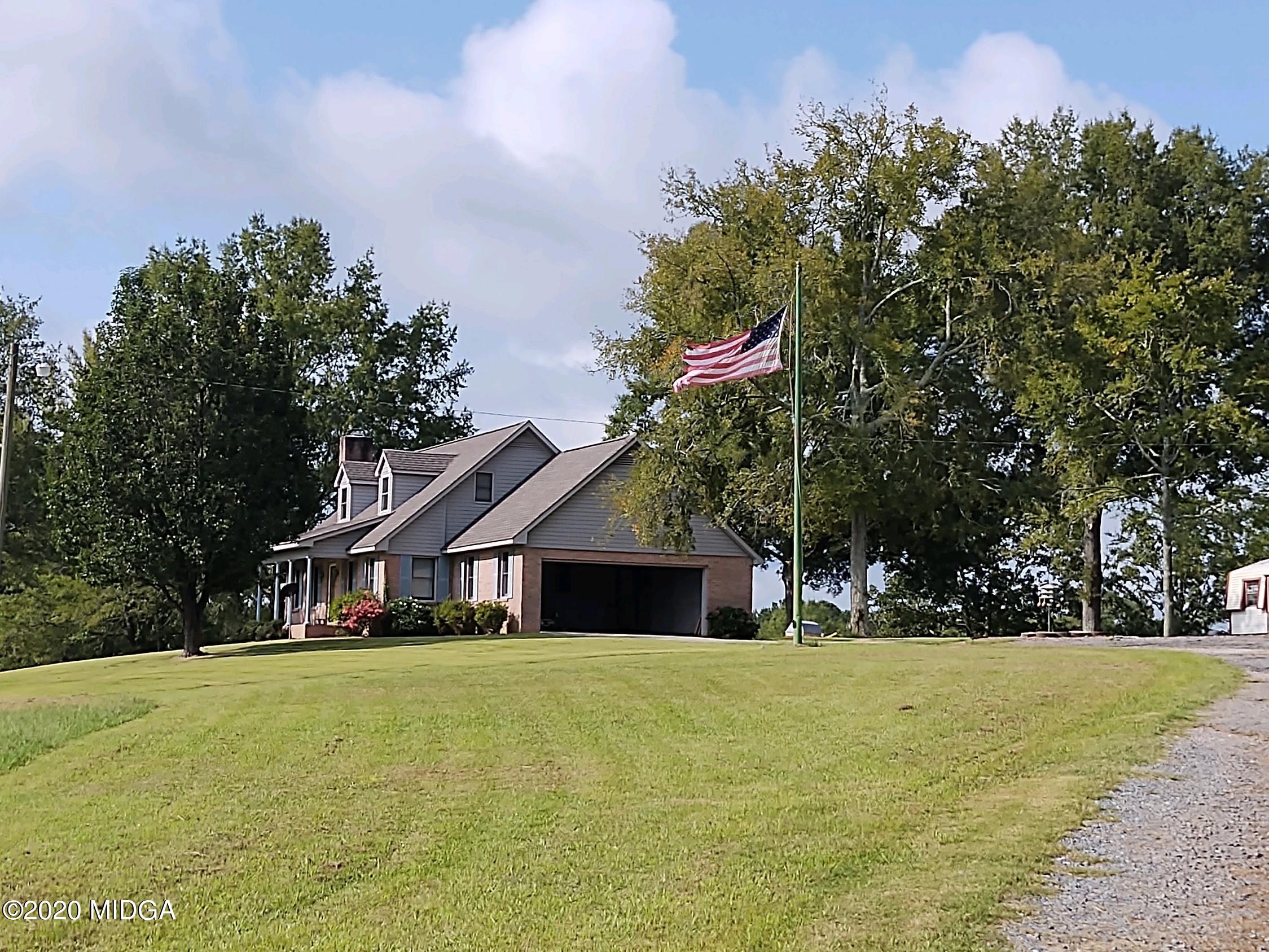 2315 Dennis Road Macon, GA 31220 - Photo 1 of 12 a front view of house with yard and green space