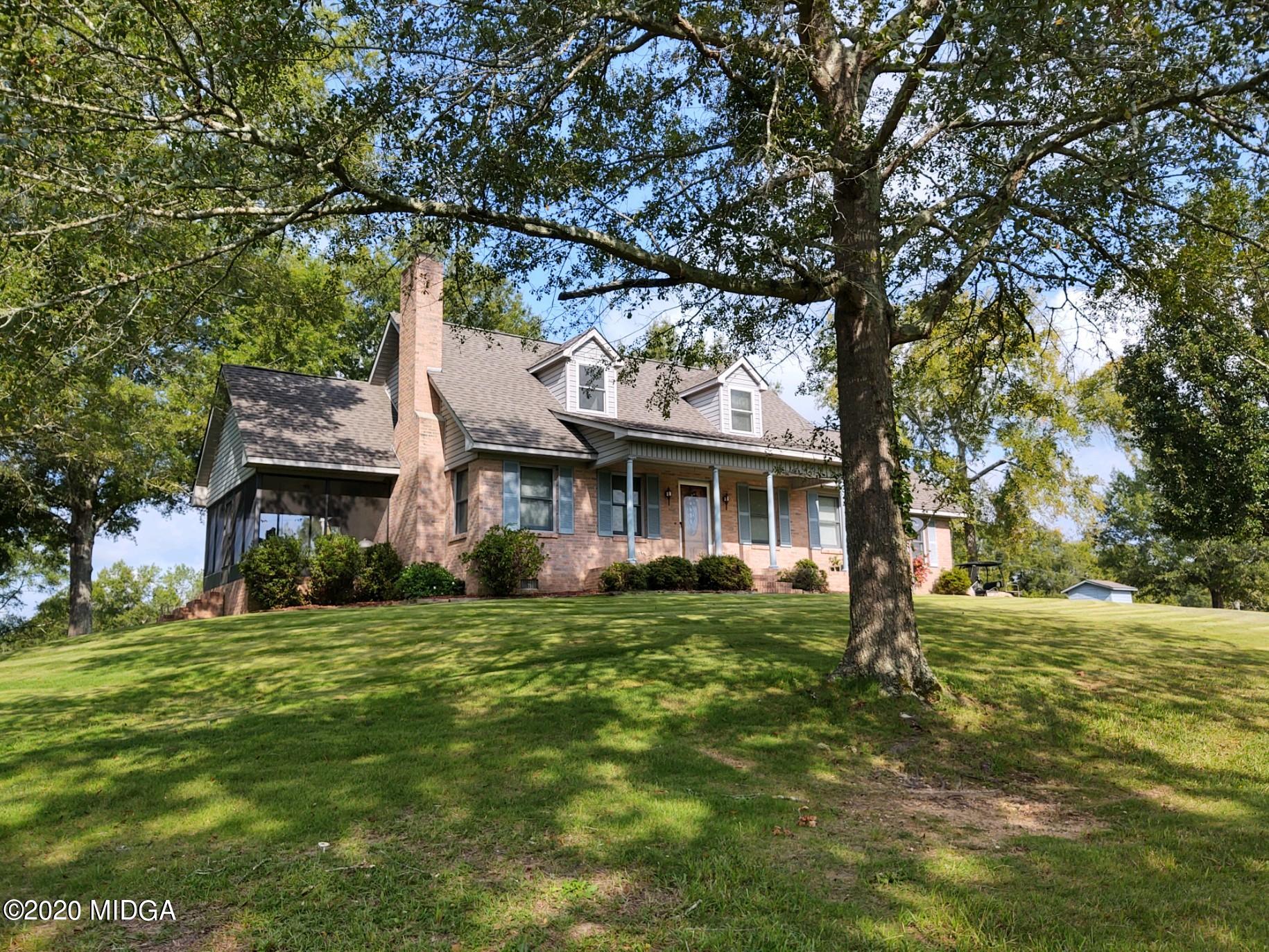 2315 Dennis Road Macon, GA 31220 - Photo 11 of 12 a front view of a house with a garden