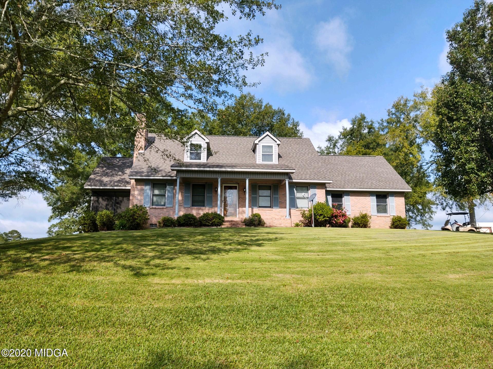 2315 Dennis Road Macon, GA 31220 - Photo 12 of 12 a front view of a house with a garden