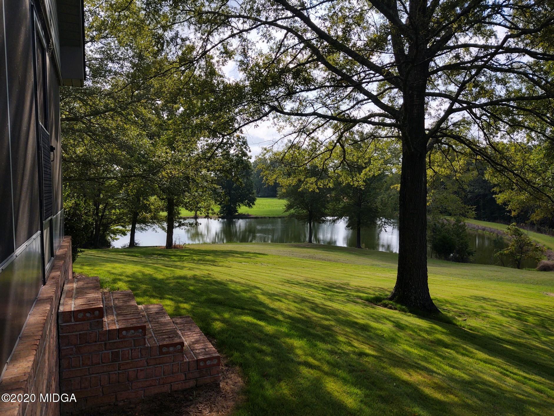 2315 Dennis Road Macon, GA 31220 - Photo 6 of 12 a view of a trees in a yard